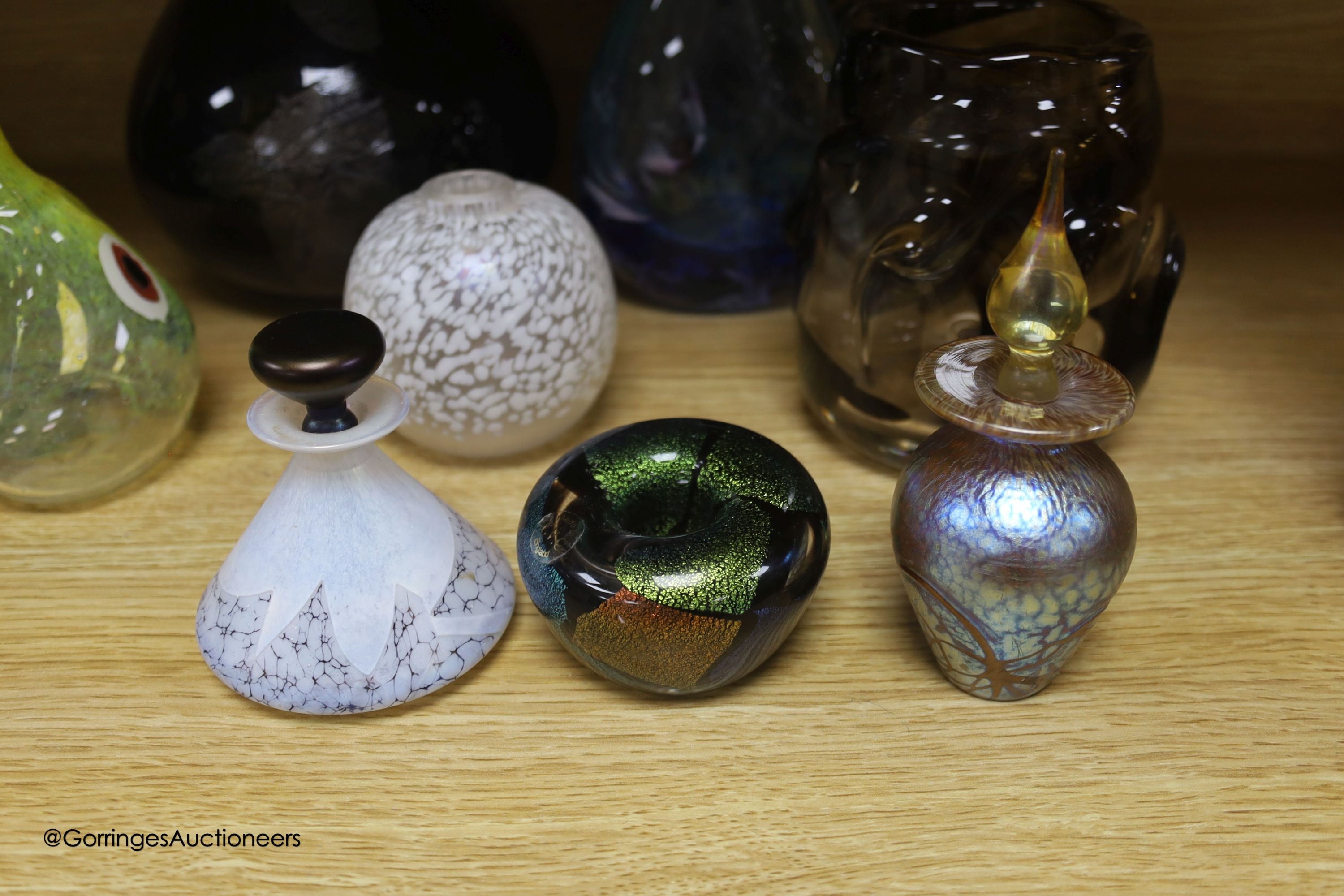 A collection of mixed studio glass